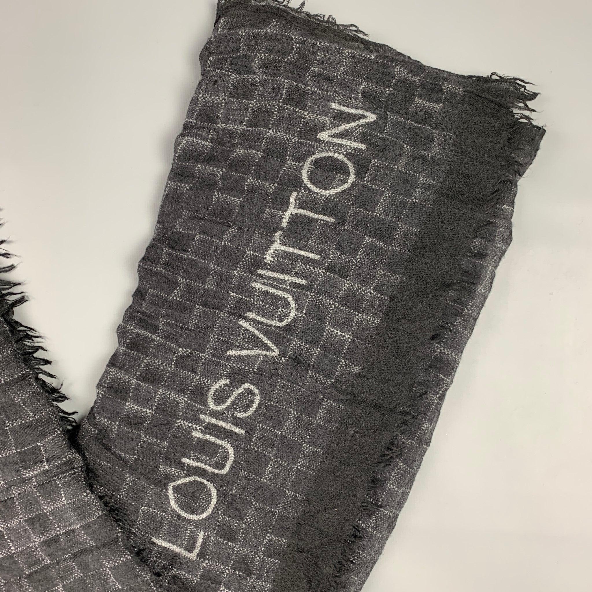 LOUIS VUITTON scarf comes in a black & grey damier print with a fringe trim. Made in Italy.
Very Good
Pre-Owned Condition. 

Measurements: 
  
74 inches  x 52 inches 
  
  
 
Reference: 116529
Category: Scarves
More Details
    
Brand:  LOUIS