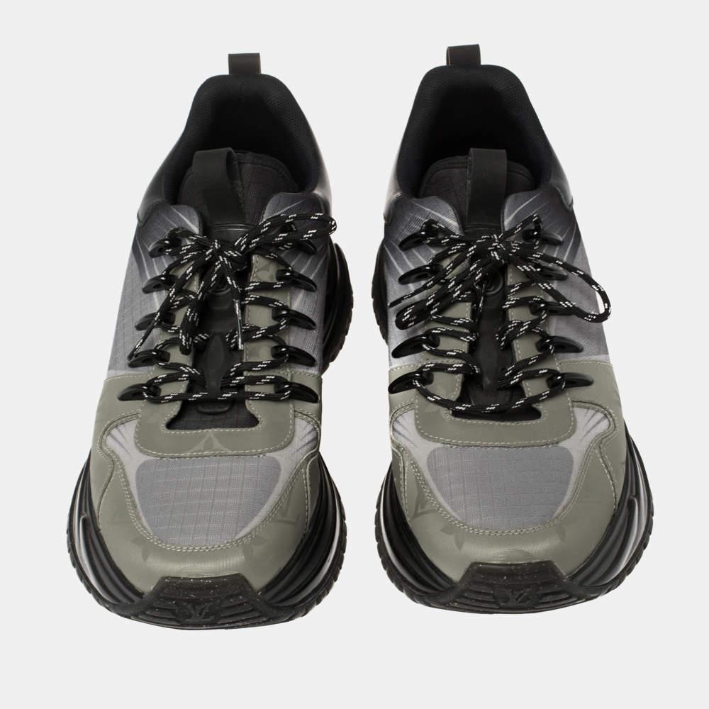 Create the most stylish and casual-chic looks using Louis Vuitton's Run Away Pulse sneakers. Constructed in mesh and leather in the shades of black and grey, these shoes also feature the signature LV logo on the side and is completed with a