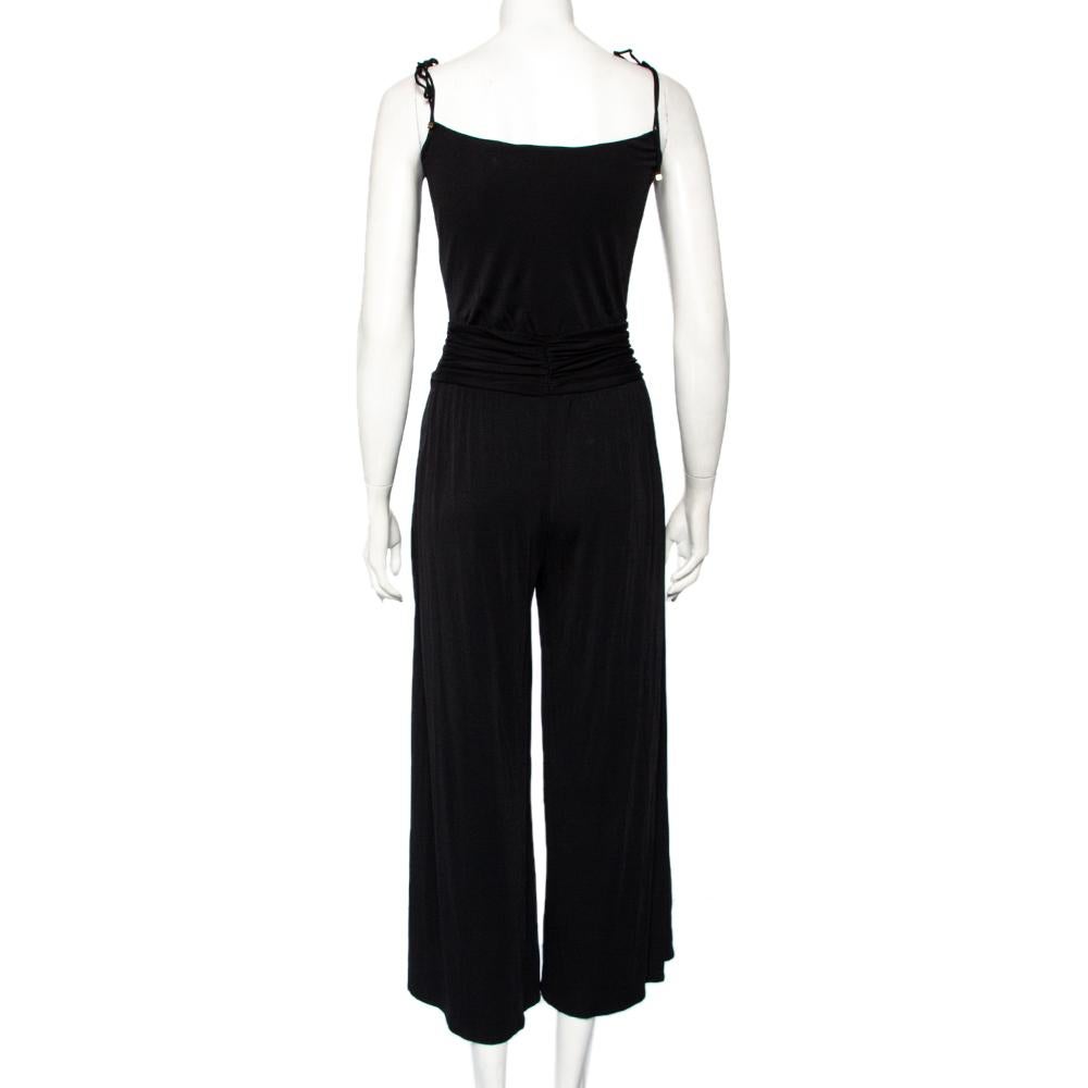 Made from silk, this jumpsuit by Louis Vuitton has been styled with considered aesthetics that enable it to be dressed up or down. It has a sleeveless silhouette, a comfortable jersey construction and ruched accents. Style this jumpsuit with heels