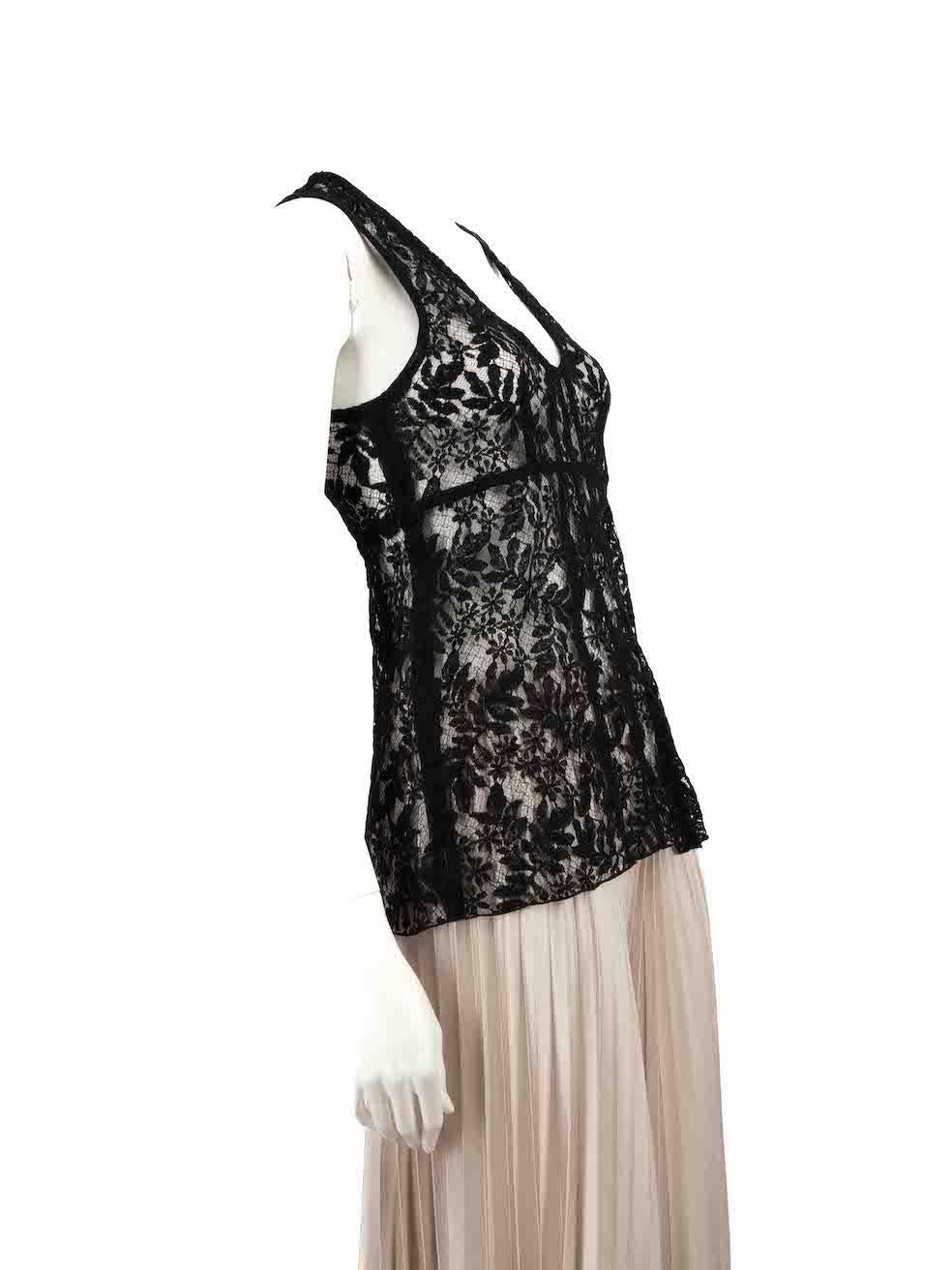 CONDITION is Very good. Hardly any visible wear to top is evident on this used Louis Vuitton designer resale item.
 
 
 
 Details
 
 
 Black
 
 Lace
 
 Tank top
 
 Back zip fastening
 
 See through
 
 
 
 
 
 Made in France
 
 
 
 Composition
 
 NO