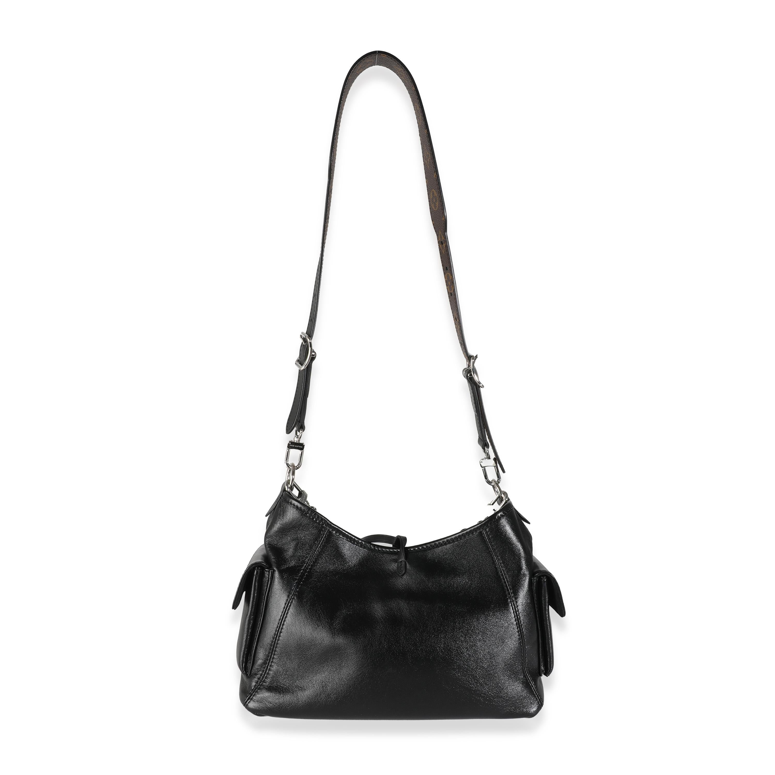 Listing Title: Louis Vuitton Black Lambskin CarryAll Cargo Vibe PM
SKU: 144245
MSRP: 3500.00 USD
Condition: Pre-owned 
Handbag Condition: Excellent
Condition Comments: Item is in excellent condition and displays light signs of wear.  Faint corner