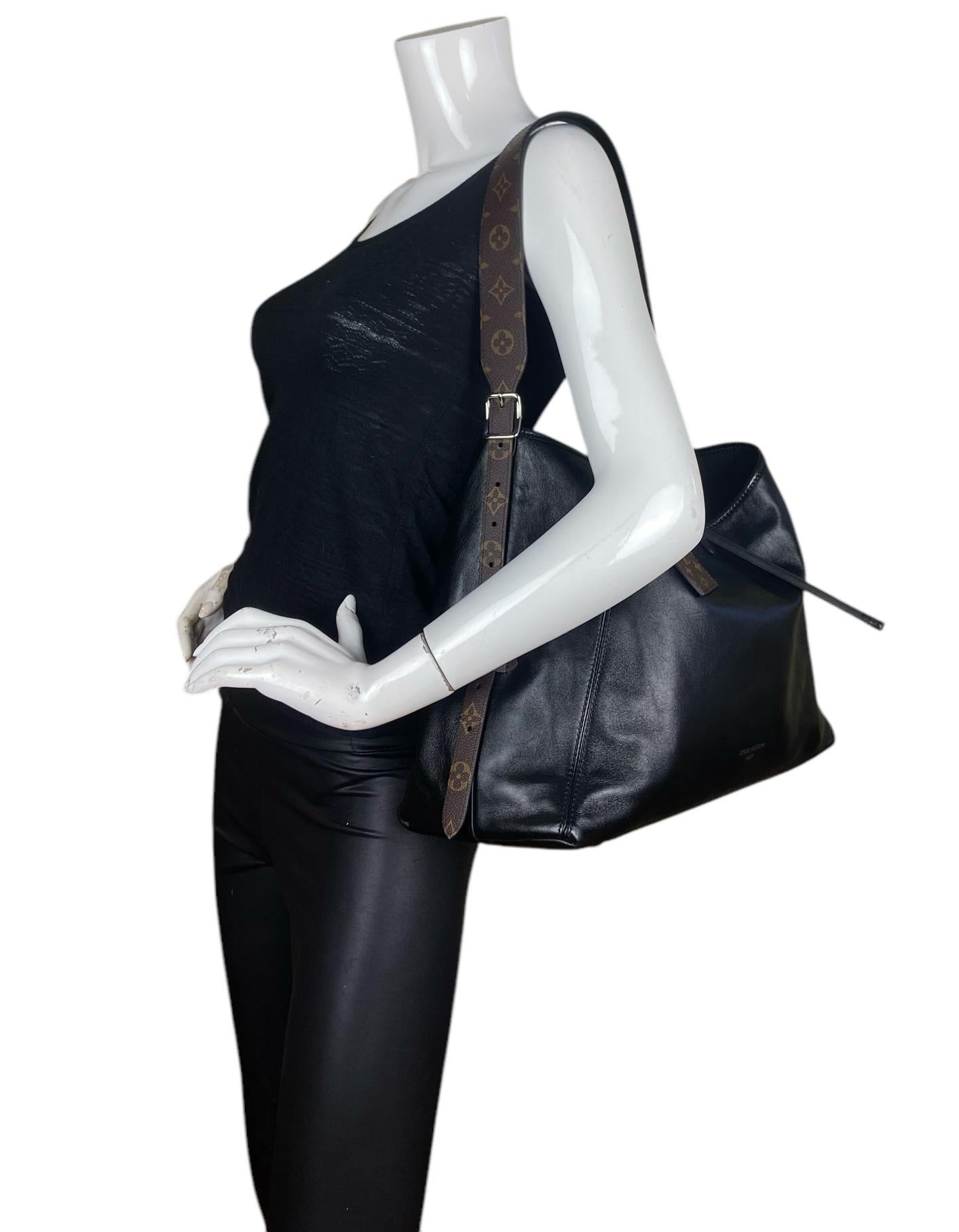 Louis Vuitton Black Lambskin Leather CarryAll Vibe MM Bag with Monogram Trim

Made In: Italy
Color: Black
Hardware: Silvertone hardware
Materials: Lambskin leather with cowhide-leather trim
Lining: Microfiber lining
Closure/Opening: Open top with
