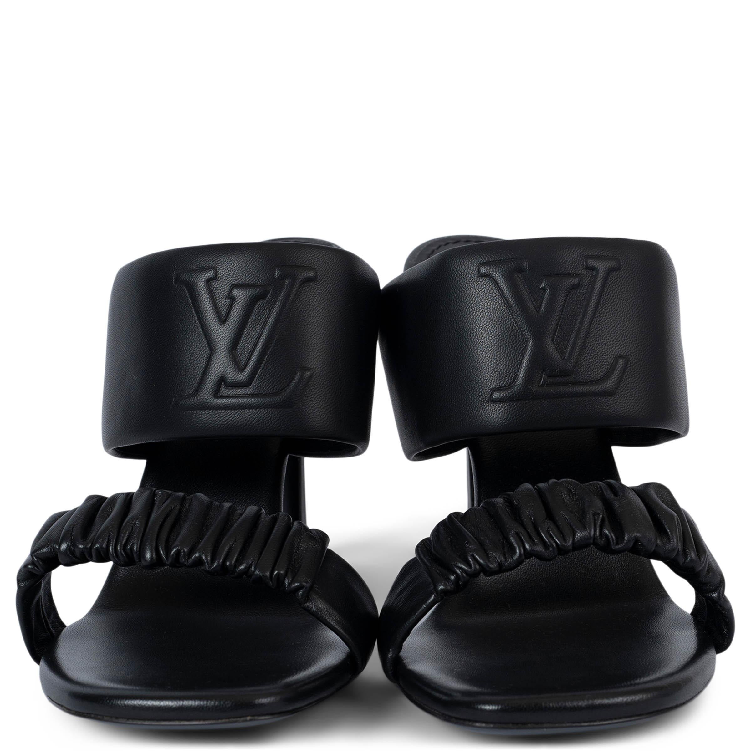 100% authentic Louis Vuitton 2023 Drapy mule sandals in smooth padded calfskin with debossed LV logo strap. Brand new. Come with dust bags. 

Measurements
Imprinted Size	41 run small
Shoe Size	40
Inside Sole	26.5cm (10.3in)
Width	8.5cm