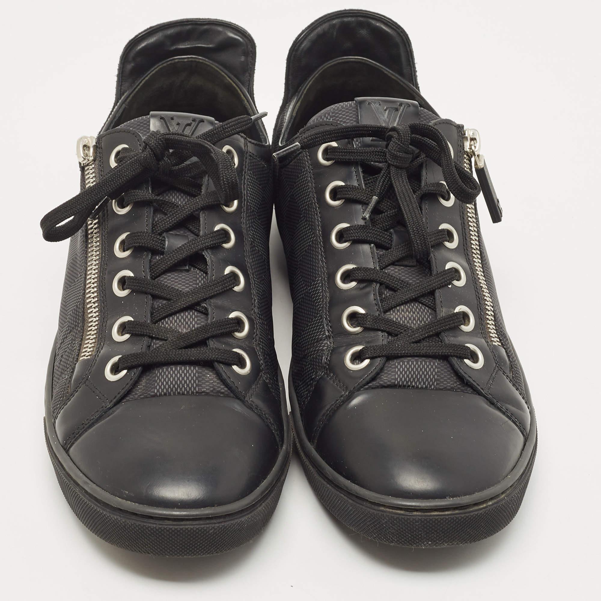 Give your outfit a luxe update with this pair of Louis Vuitton black sneakers. The shoes are sewn perfectly to help you make a statement in them for a long time.

Includes
Original Dustbag, Original Box