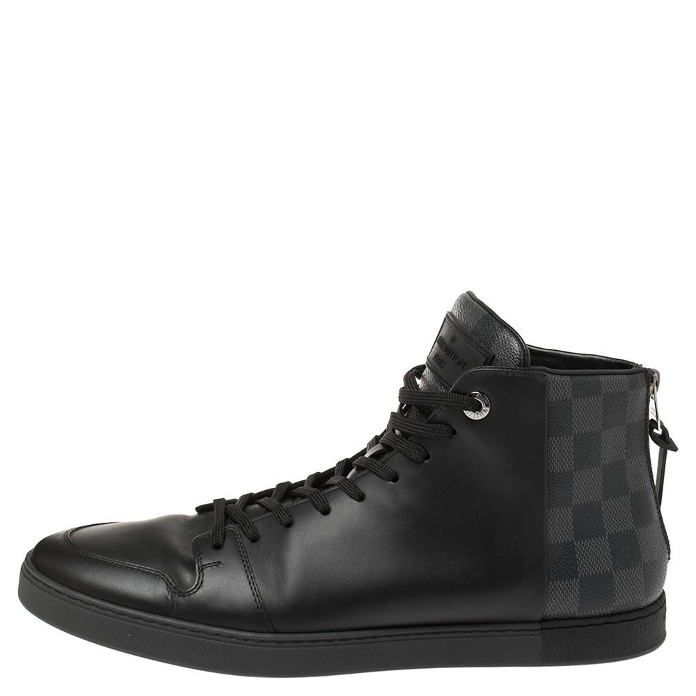 These contemporary sneakers are styled with a modern take on Louis Vuitton’s iconic details. Crafted from leather and designed with the brand's signature Damier canvas, they truly embody luxury and comfort. These sneakers have a high top silhouette