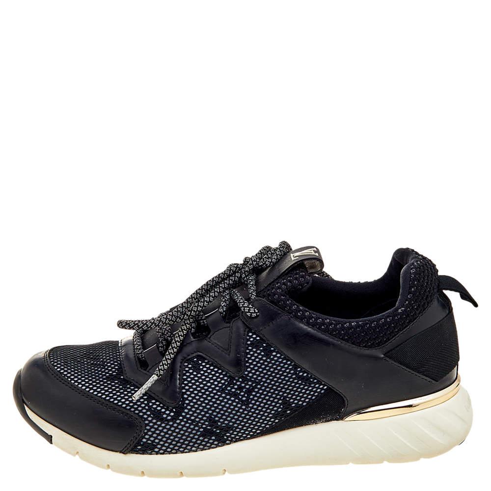 The House of Louis Vuitton brings class and luxury to your outfit with these sneakers. They are made from black leather and mesh into a low-top silhouette. They flaunt lace-up on the vamps and tough rubber soles. Get these stunning LV sneakers today