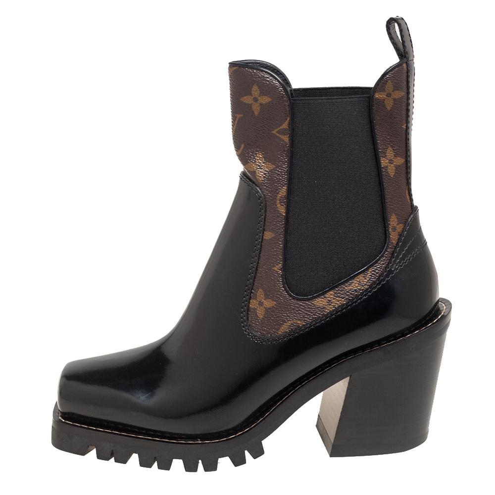 You will always be style-ready when you flaunt these gorgeous ankle boots by Louis Vuitton. Crafted using patent leather, they feature pull tabs, platforms, and block heels. The addition of monogram canvas looks stunning with the black leather of