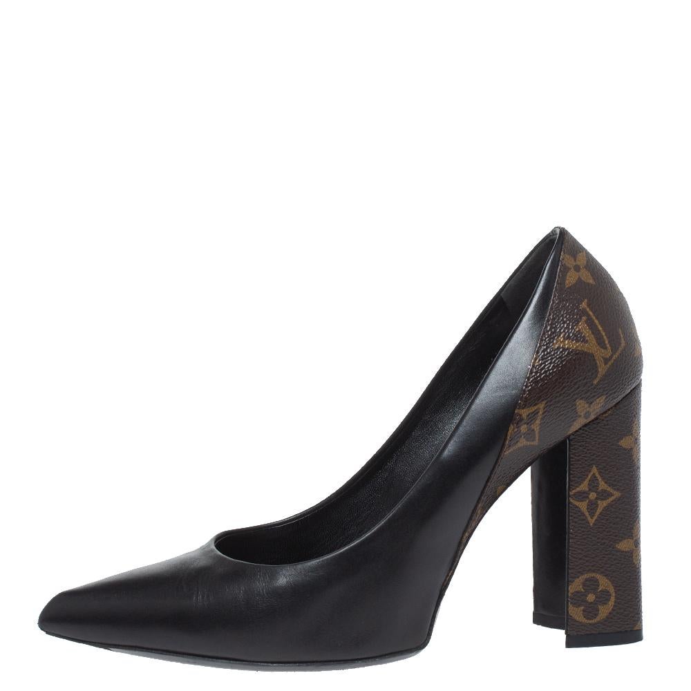 These pumps from Louis Vuitton were made to delight the tastes of all fashion-forward ladies. The pointed toe pumps are covered in black leather and detailed with monogram canvas on the counters and on the 10 cm heels.

Includes:Original Dustbag
