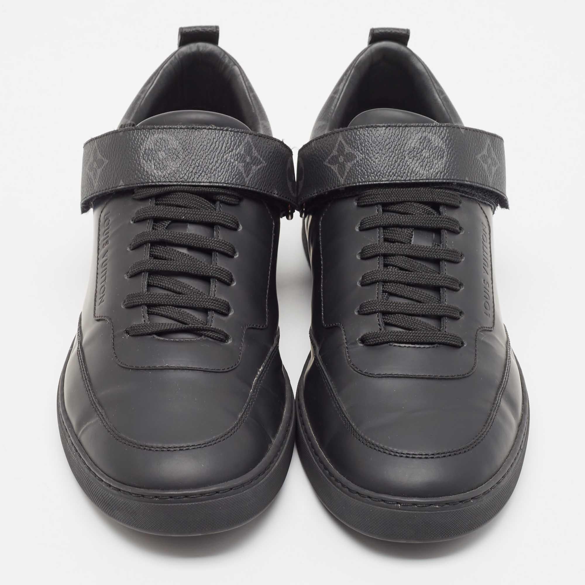 Step into fashion-forward luxury with these LV black sneakers. These premium kicks offer a harmonious blend of style and comfort, perfect for those who demand sophistication in every step.

Includes: Original Dustbag, Info Booklet, Extra Lace


