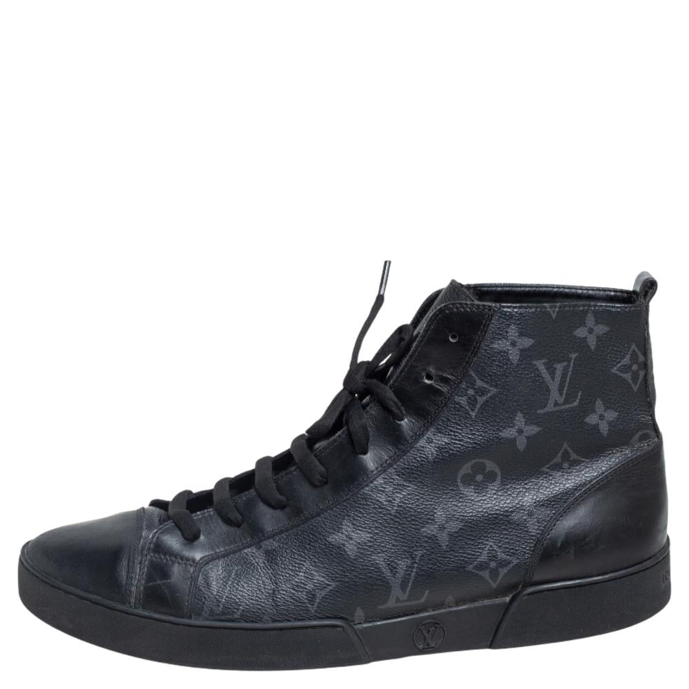 A high-fashion take on a practical style, these sneakers from Louis Vuitton are styled in a high-top silhouette with a sophisticated charm that will surely lure men who love minimal styling. Crafted from Monogram Eclipse coated canvas and leather,