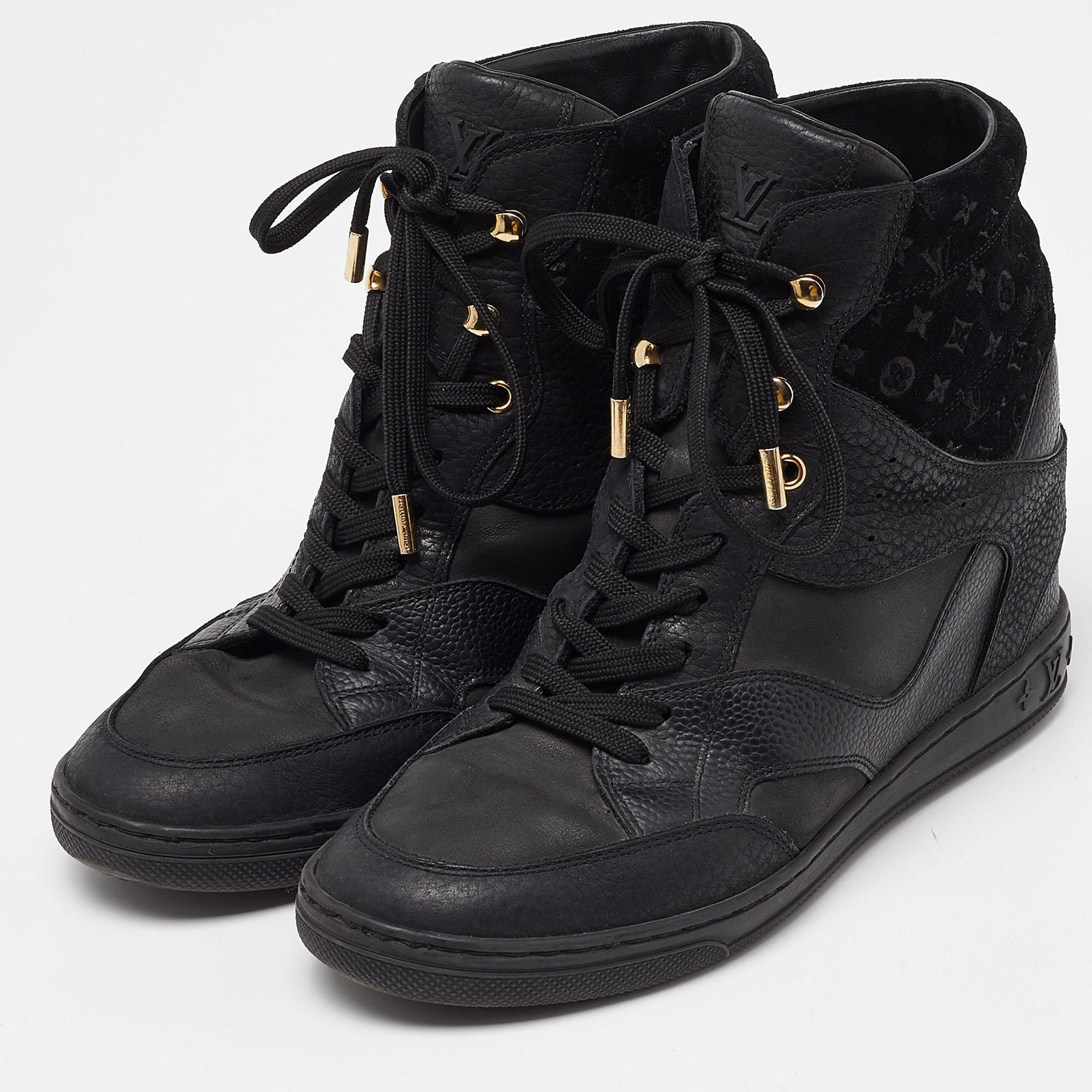 Give your outfit a luxe update with this pair of Louis Vuitton wedge sneakers. The shoes are sewn perfectly to help you make a statement in them for a long time.