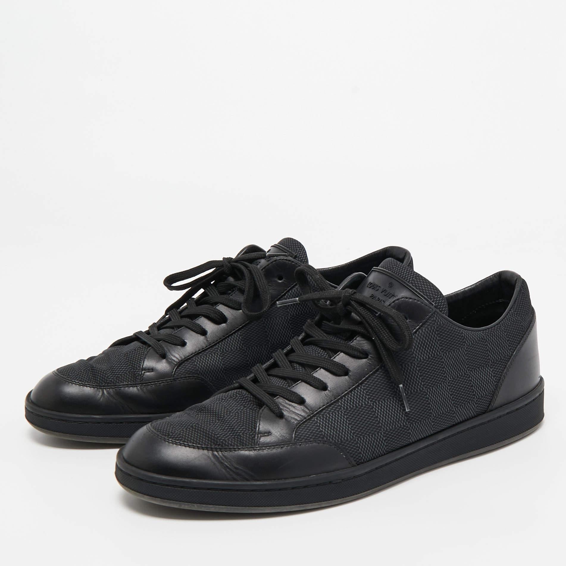 Elevate your footwear game with these LV black sneakers. Combining high-end aesthetics and unmatched comfort, these sneakers are a symbol of modern luxury and impeccable taste.

