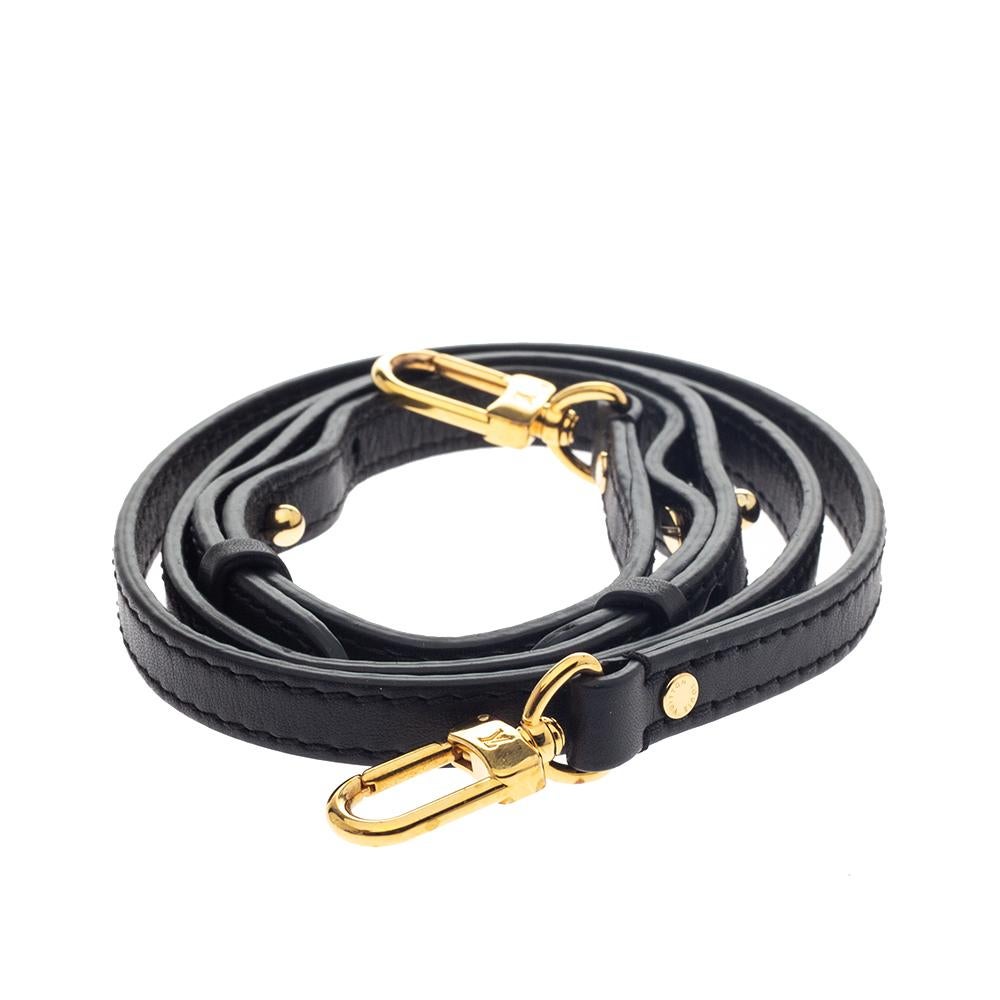 Accessorise your everyday bags with this detachable shoulder strap from the house of Louis Vuitton. Designed in black leather, this slender strap comes with gold-tone lobster clasps on each end. Amp up your everyday bags and lend it a unique look