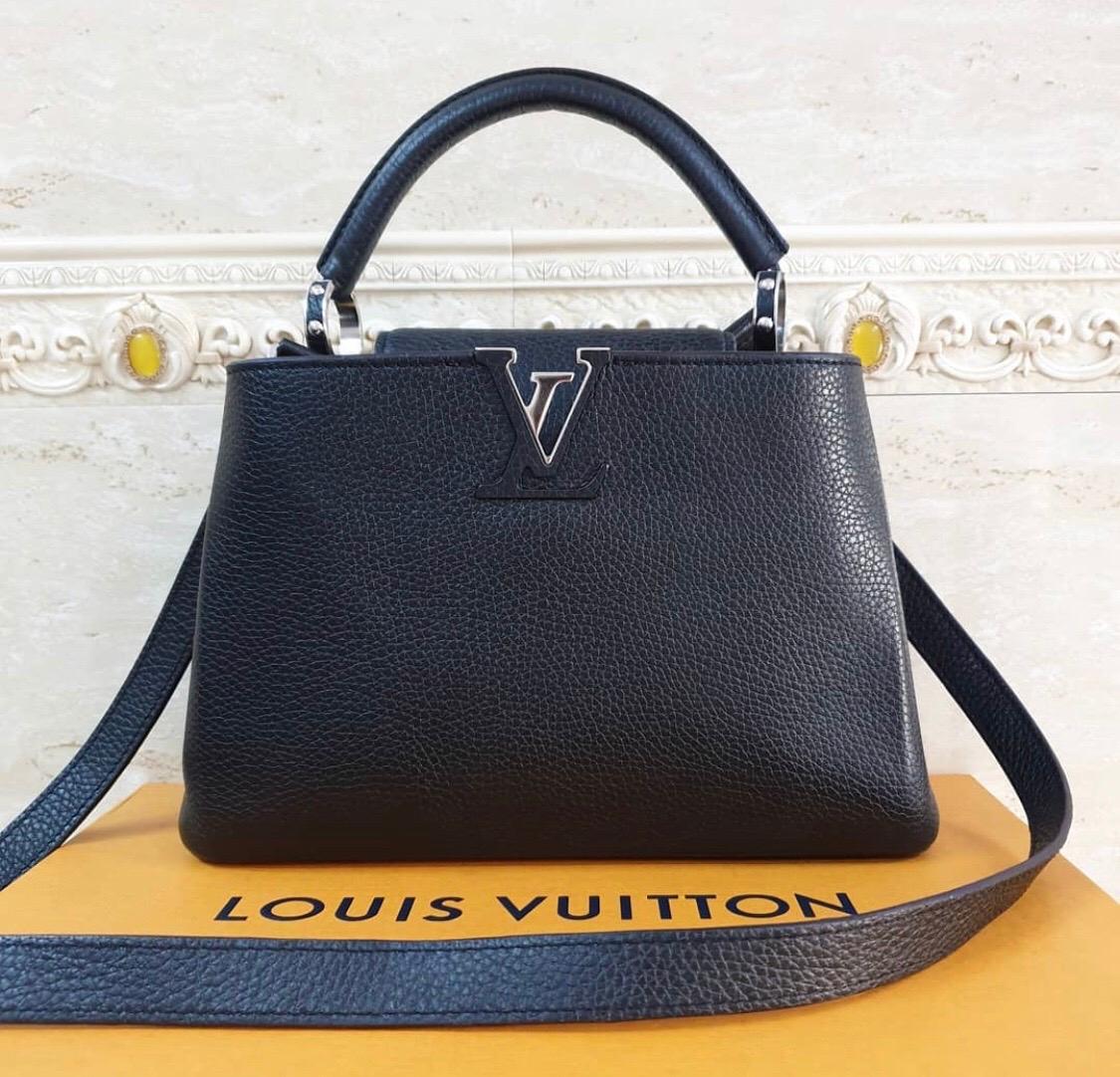Louis Vuitton Capucines

BB size


    Black
    Taurillon leather
    Siver  hardware
    Double carry style: flap inside or outside
    Compartmented interior with zipped pocket
    4 protective metal bottom studs
    Strap:Removable, adjustable
 