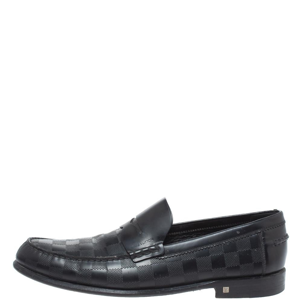Loafers like these ones from Louis Vuitton are worth every penny because they epitomize both comfort and style. Crafted from black leather, they feature the signature Damier Infini pattern and penny keeper straps. Complete with leather-lined