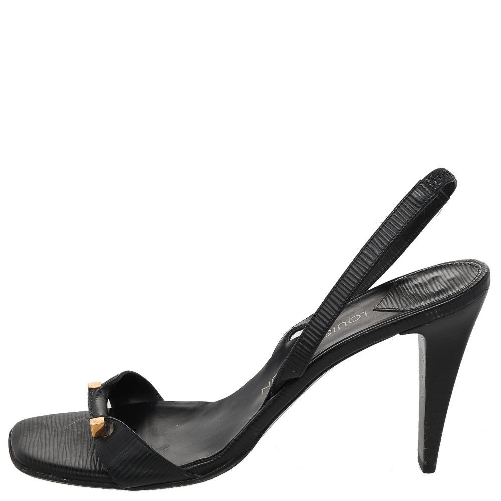 Comfort and style are what these Louis Vuitton sandals embody! Crafted from black leather, they feature an open-toe and a comfy leather-lined interior along with the brand's iconic label. Complete with the signature dice motifs on the front and