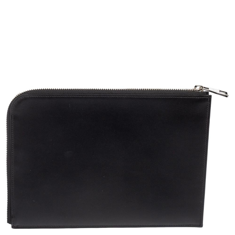 Keep your documents protected and secured in an organised manner with this Documents Portfolio pochette from Louis Vuitton. It has been crafted from black leather and designed with a silver-tone zipper which protects an Alcantara interior for you to