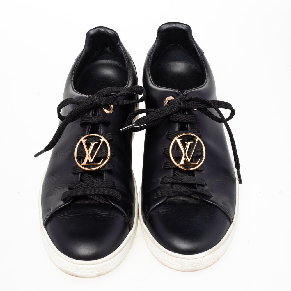 These Frontrow sneakers from Louis Vuitton are all you need to make an impression without trying too much! The black sneakers have been crafted from leather and styled with round toes. They flaunt lace-ups and gold-tone logo on the vamps. The pair