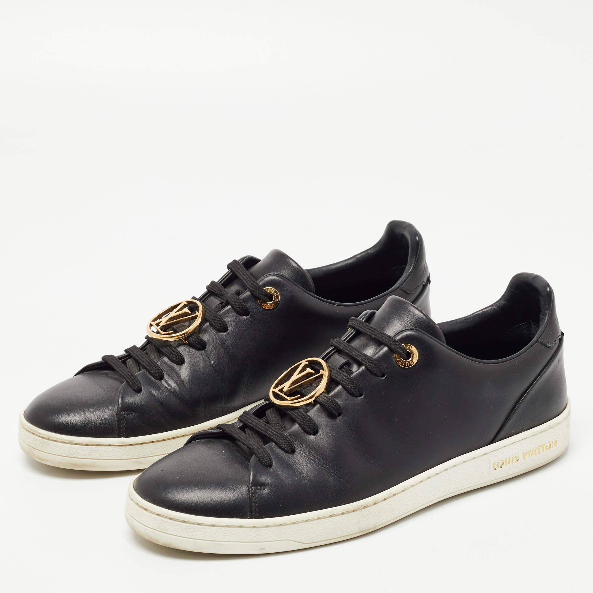 These Frontrow sneakers from Louis Vuitton are all you need to add an extra edge to your outfit. This black pair has been crafted from leather and styled with round toes, lace-ups, and gold-tone logo details on the upper. Balanced on rubber soles,