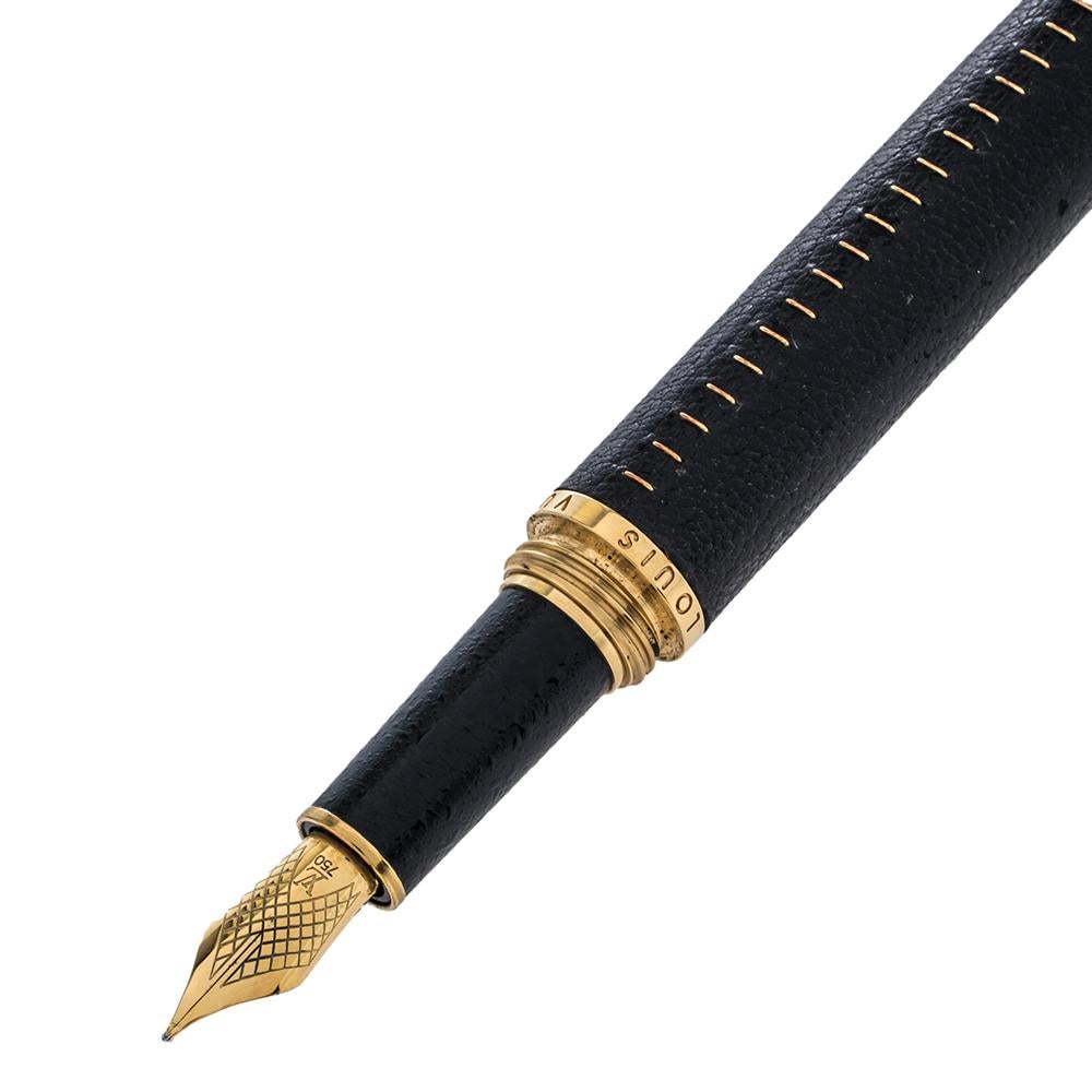 Bring flair to your writing with the elegant Louis Vuitton fountain pen. The black leather body enhanced with gold-plated metal makes this a luxurious writing instrument. The refined construction and the 18k gold nib make it a contemporary