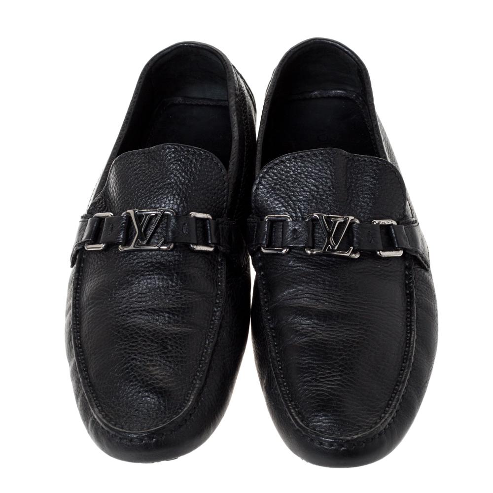 Louis Vuitton loafers are perfect for making a fashion statement. These black Hockenheim loafers are crafted from leather and feature a smart design. They flaunt round toes, LV detail on the vamps, and comfortable leather-lined insoles.

