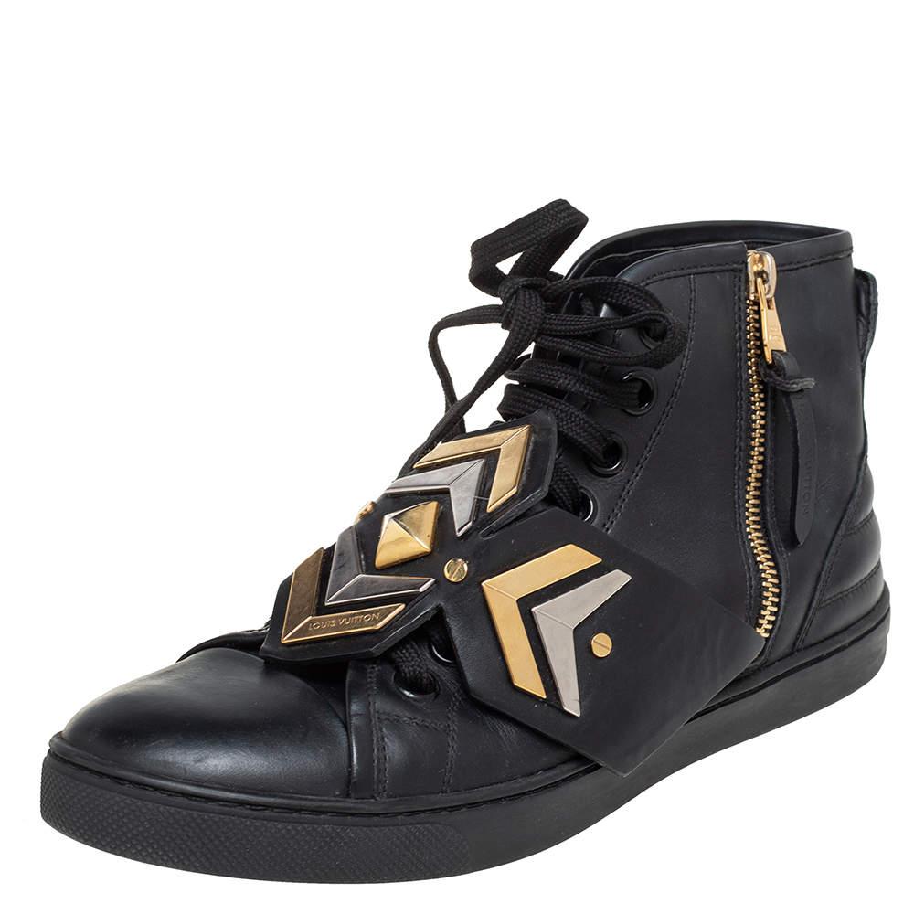 Get these super stylish Louis Vuitton sneakers and make a fashion statement wherever you go. Crafted from black leather, they feature unique gold-tone and silver-tone hardware embellishments at the fronts along with classic laced-up details. They