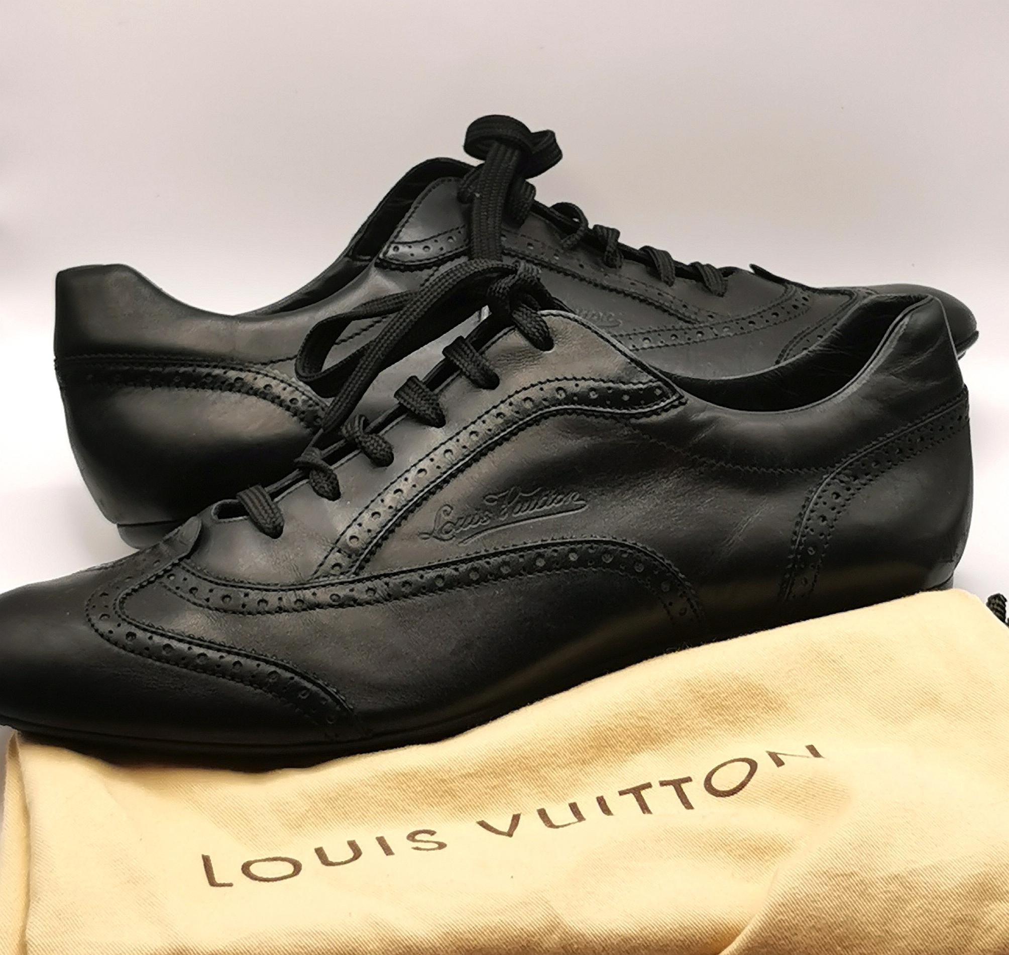 Louis Vuitton black leather lace up brogue style sneakers  In Good Condition For Sale In NEWARK, GB