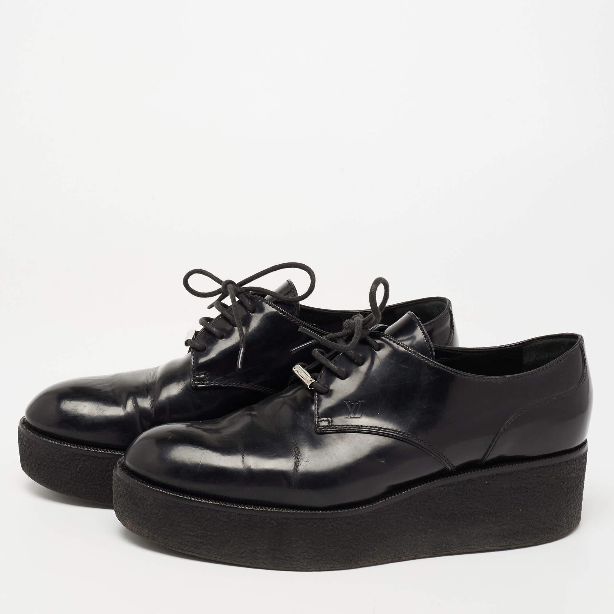 Louis Vuitton's timeless aesthetic and stellar craftsmanship in shoemaking is evident in these oxfords. Crafted from leather, the uppers are equipped with lace ties and the shoes are finished with platforms and durable rubber soles.

