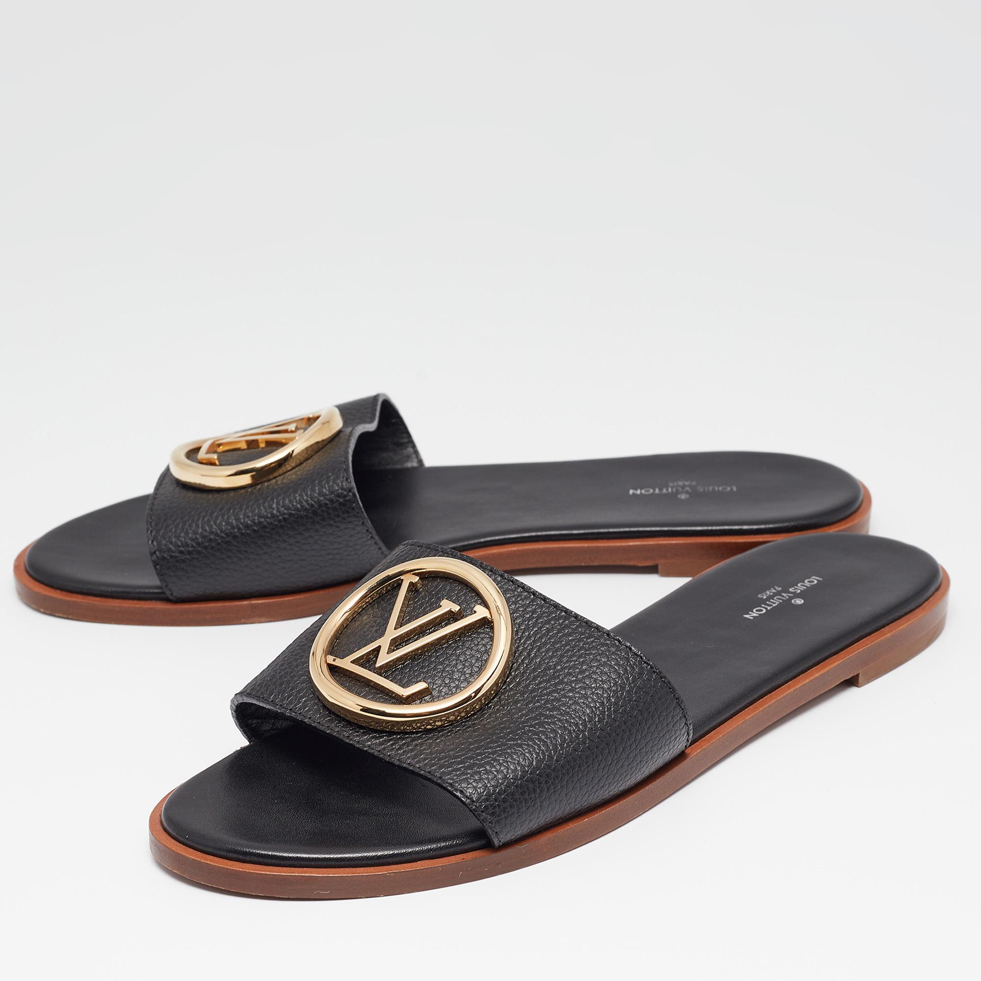 Enhance your casual looks with a touch of high style with these Louis Vuitton slides. Rendered in quality material with a lovely hue adorning its expanse, this pair is a must-have!

