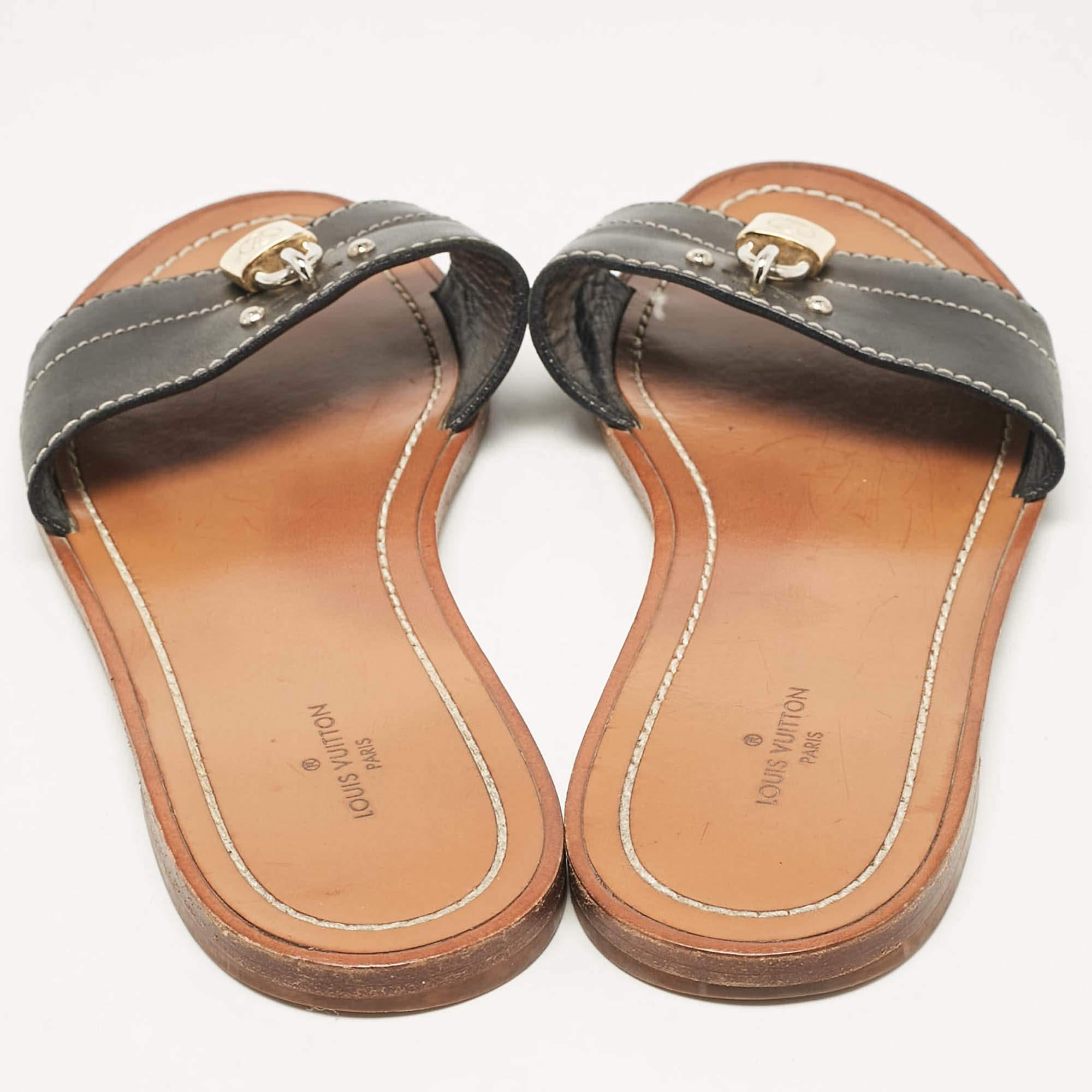 Louis Vuitton Schwarz Leder Lock It Slide Flats Größe 37 Damen im Angebot