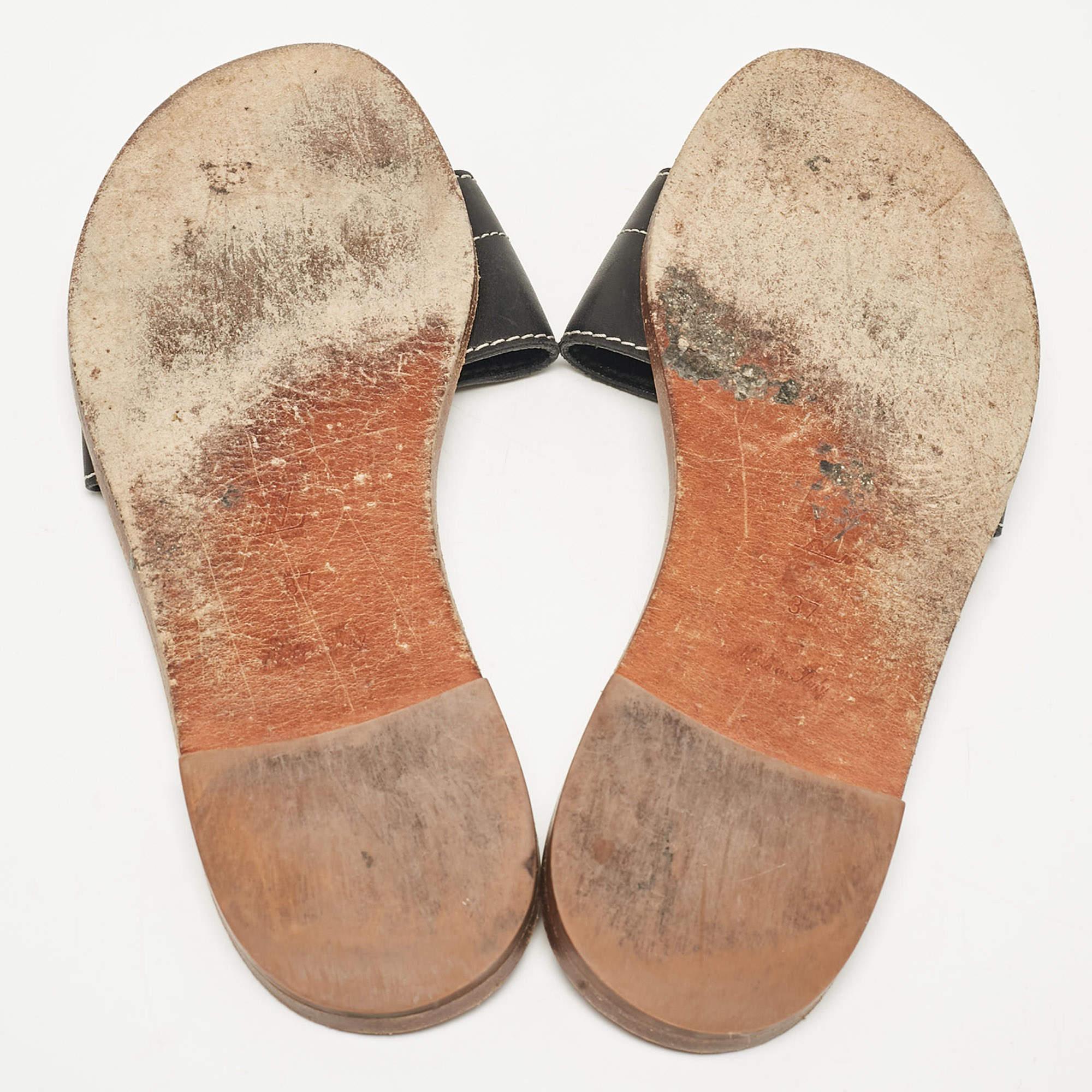 Louis Vuitton Schwarz Leder Lock It Slide Flats Größe 37 im Angebot 1