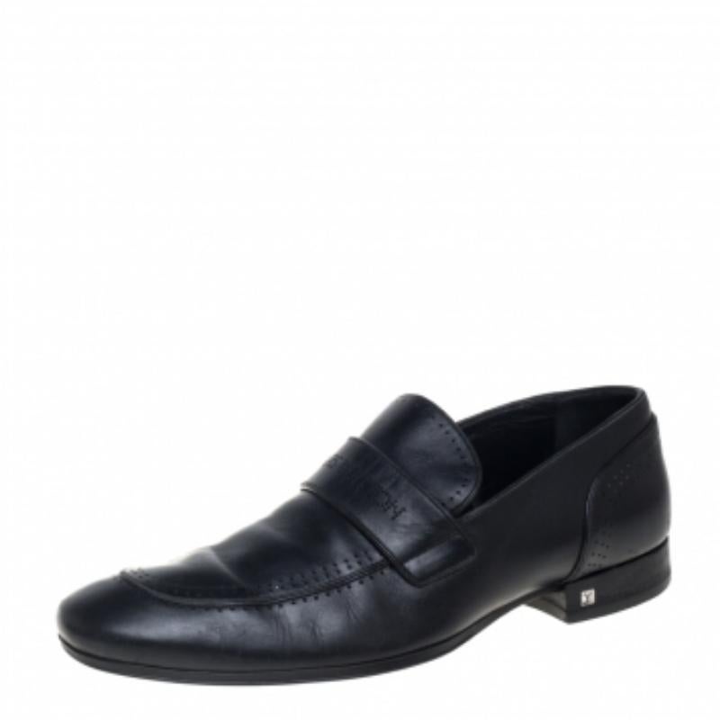 Crafted with beauty from leather, this pair of loafers by Louis Vuitton is a blend of luxury and comfort. They feature the signature label on the uppers and perforated accents. The loafers have a classy structure and are so stylish, they'll enhance