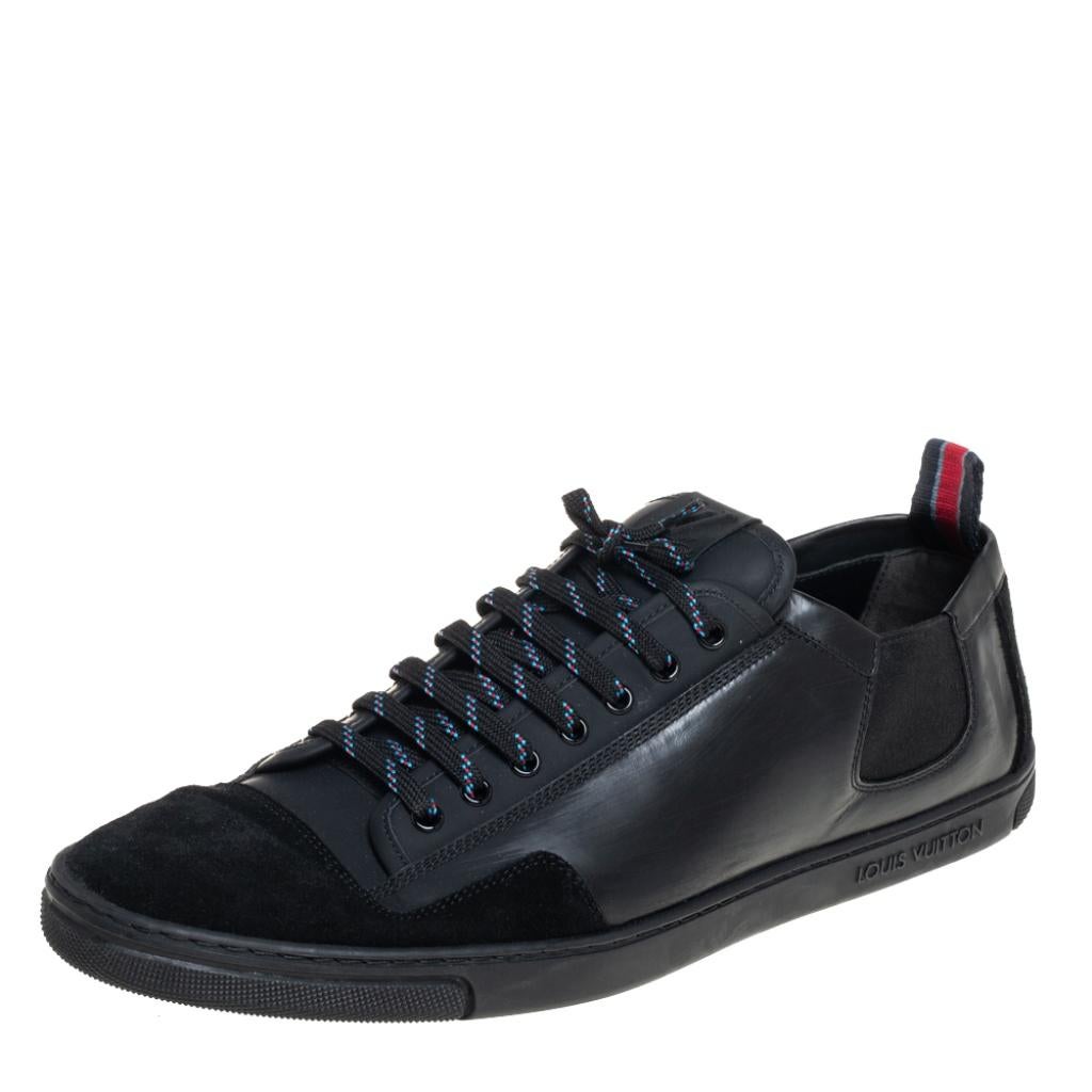 Experience footwear ease with this pair of sneakers by Louis Vuitton. They've been crafted from leather in a black shade into a design of round toes and lace-up on the vamps. The leather insoles add to the comfort of the pair.

