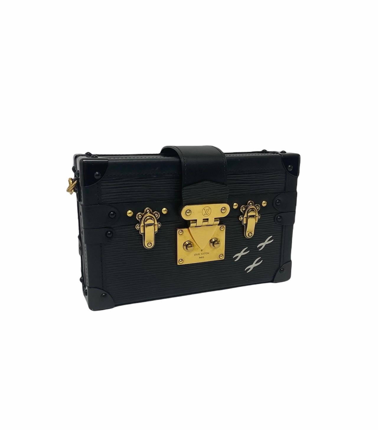 Louis Vuitton Petite Malle, is a bag that pays homage to Louis Vuitton trunks  reproducing every detail, from the shape to the iconic s-closure, up to the golden metal parts.  The exclusive model is made of Epi leather, with smooth calfskin trim and