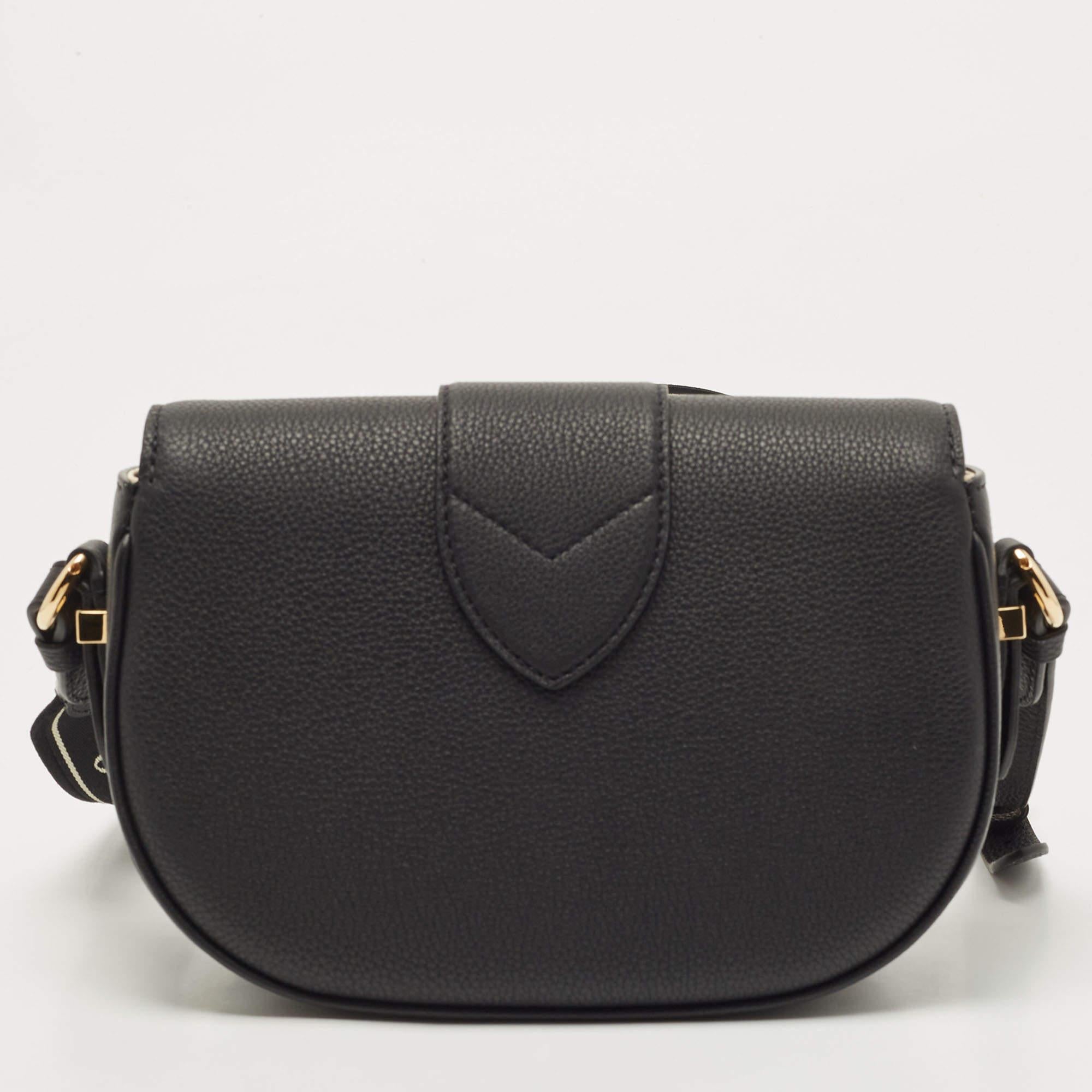 The Louis Vuitton Pont 9 soft bag is an exquisite luxury accessory crafted with high-quality black leather. Its sleek and timeless design features a spacious main compartment, complemented by gold-tone hardware and an adjustable shoulder strap. The