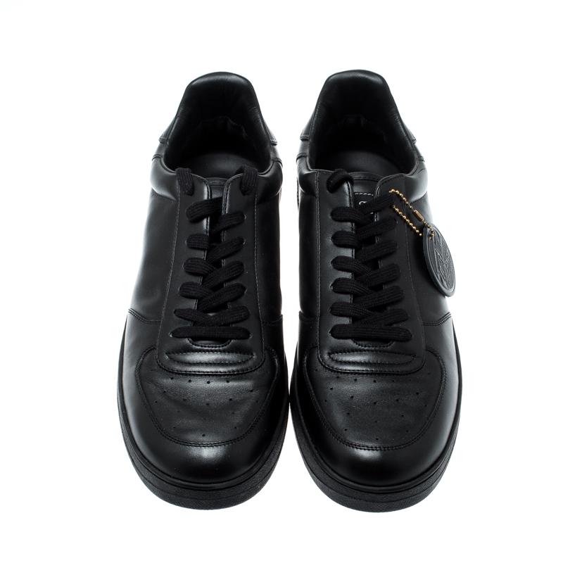 These black sneakers from Louis Vuitton are perfect for days when you wish for comfort and style! The Rivoli sneakers are crafted from leather and feature round toes, lace-ups on the vamps and tough rubber soles. They are finished with the label on