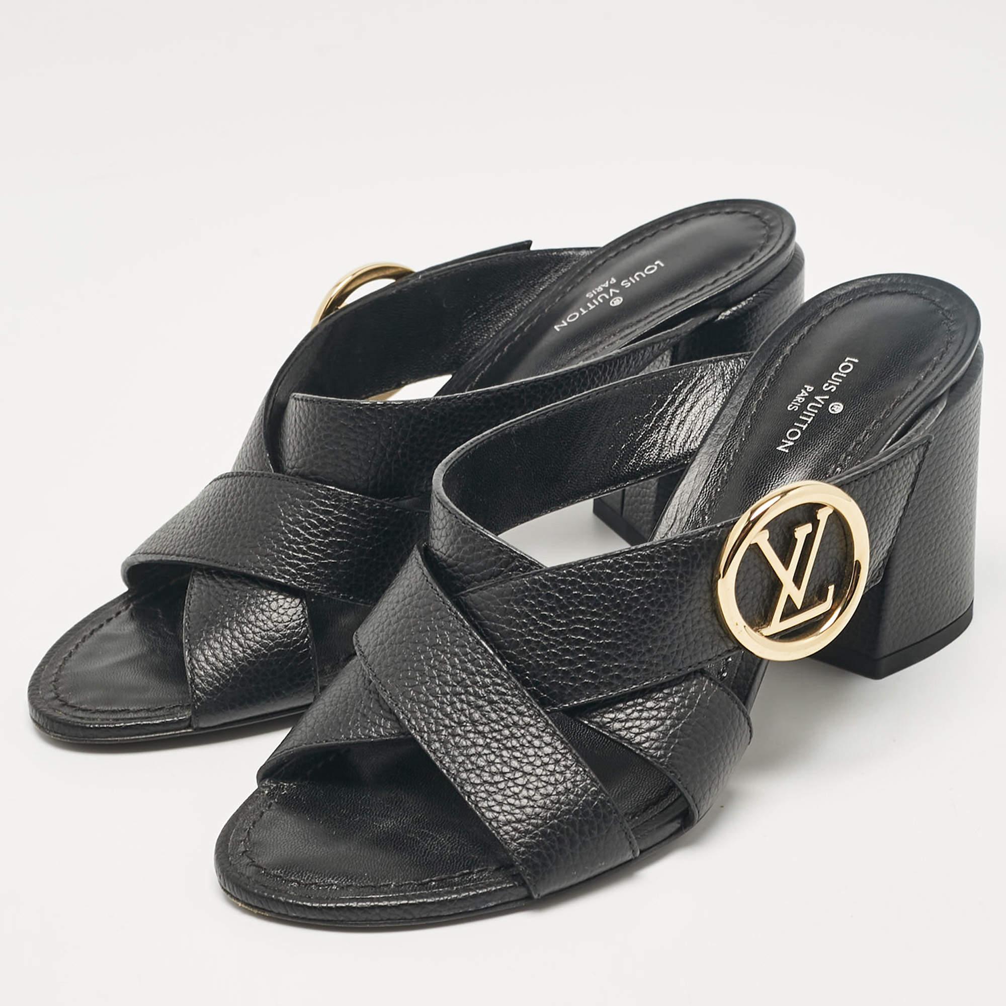 Perfectly sewn and finished to ensure an elegant look and fit these LV slide heels are a purchase youll love flaunting. They look great on the feet.