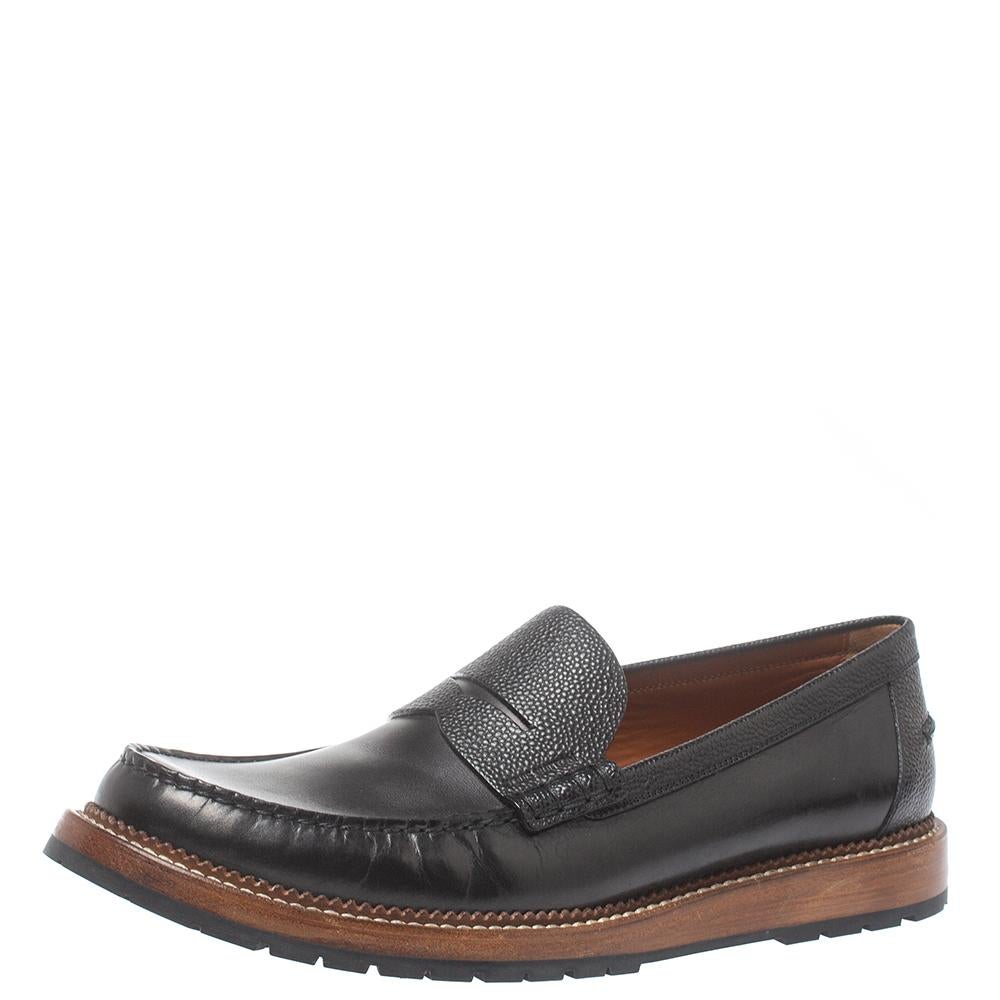 Crafted using durable leather and designed with neat stitching and pebbled detailing, these Louis Vuitton loafers are worth the buy. Finished with rubber soles, the slip-on loafers are fashionable and comfortable.

Includes: Original Dustbag, Info