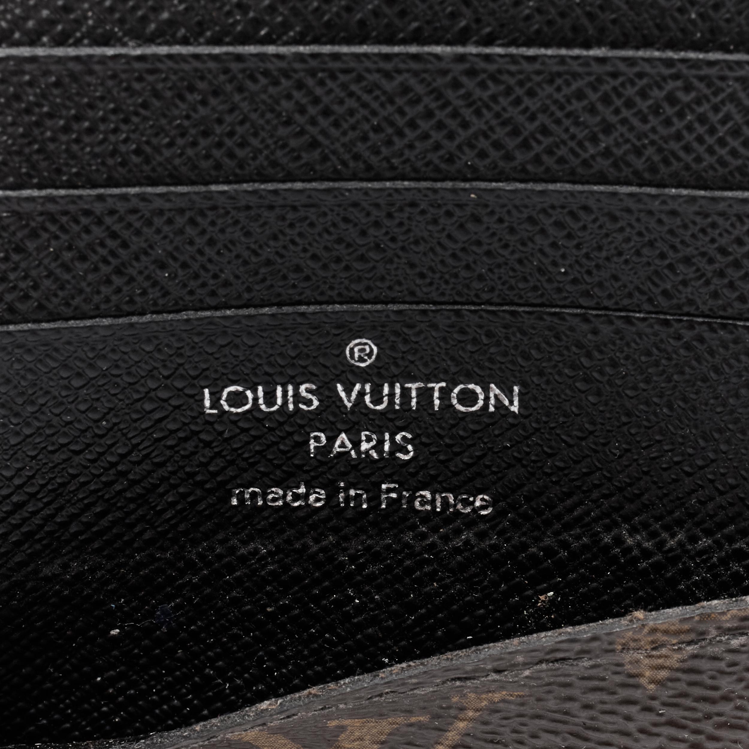 Men's LOUIS VUITTON black leather spine brown LV monogram canvas bifold wallet