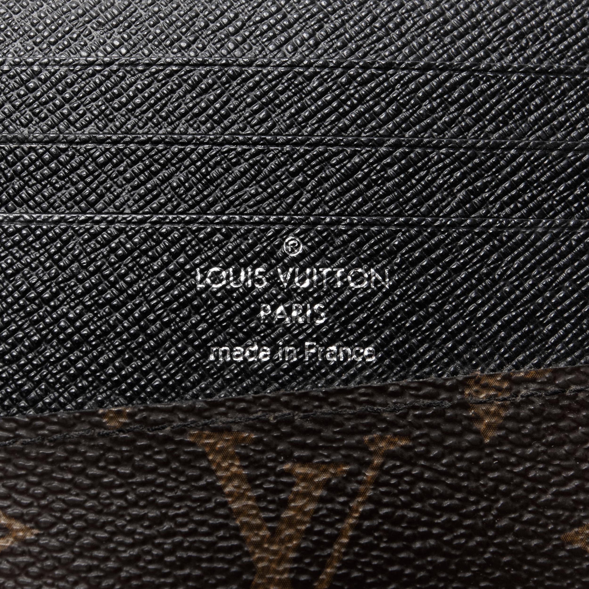 LOUIS VUITTON black leather spine brown LV monogram canvas bifold wallet 1
