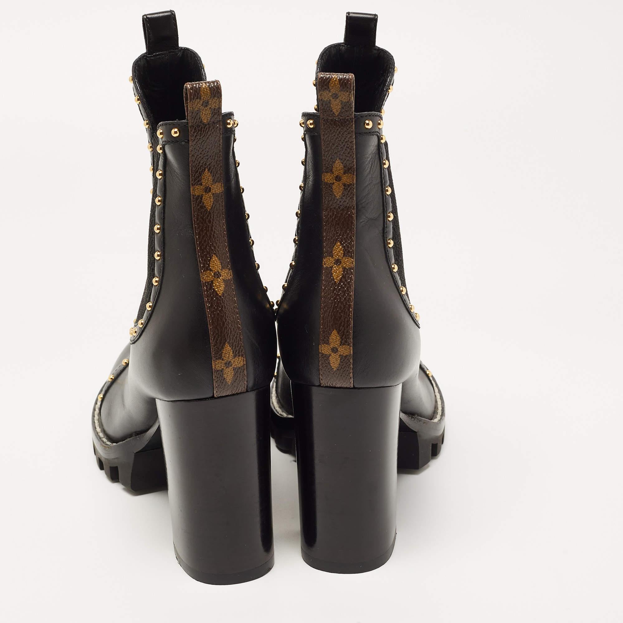 Give your outfit a chic update with this pair of Louis Vuitton boots for women. The creation is sewn perfectly using leather and added with studs, Monogram canvas trims, and block heels. Make a statement in these!

