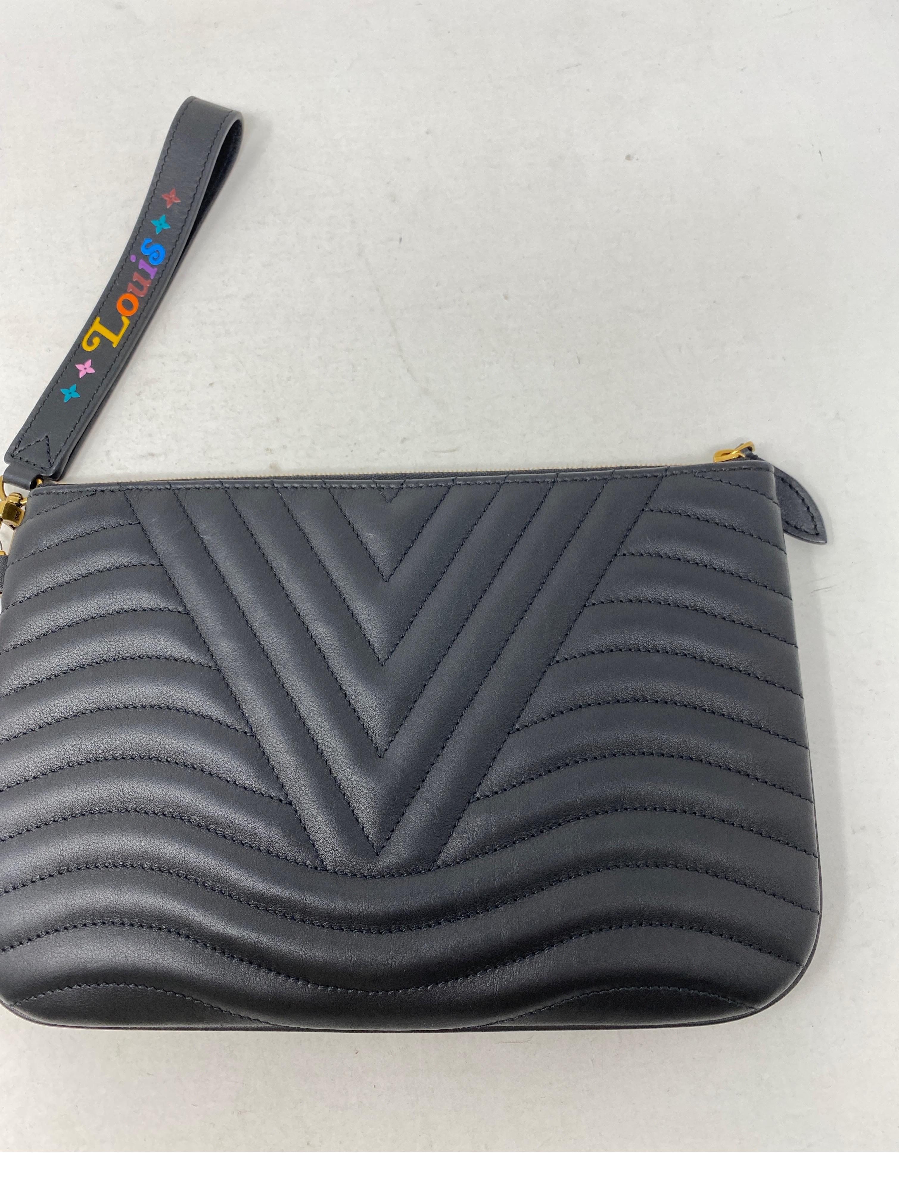 Louis Vuitton Black Leather Wave Pouch  In New Condition In Athens, GA