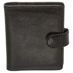 Louis Vuitton black lizard blank note pad with card slot and snap closure. 