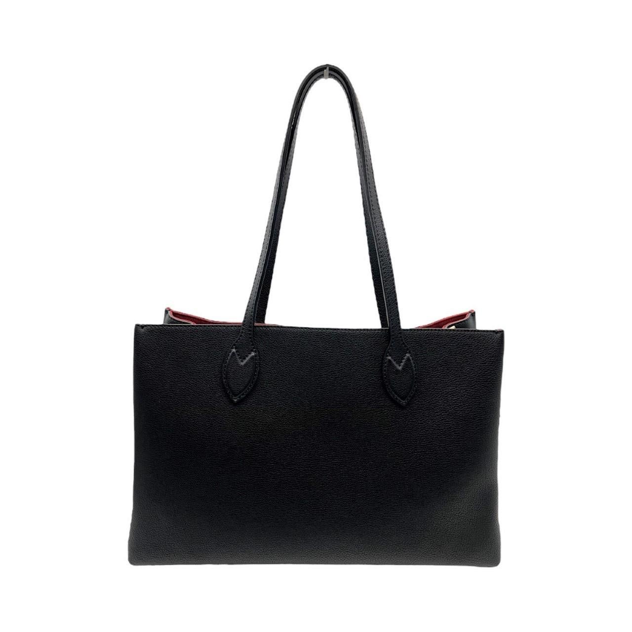 We are offering this very popular Louis Vuitton Lockme Shopper Tote. Made in France, it is finely crafted of grained calfskin leather in black. The bag features black leather strap handles with a polished gold-tone Louis Vuitton turn lock. This