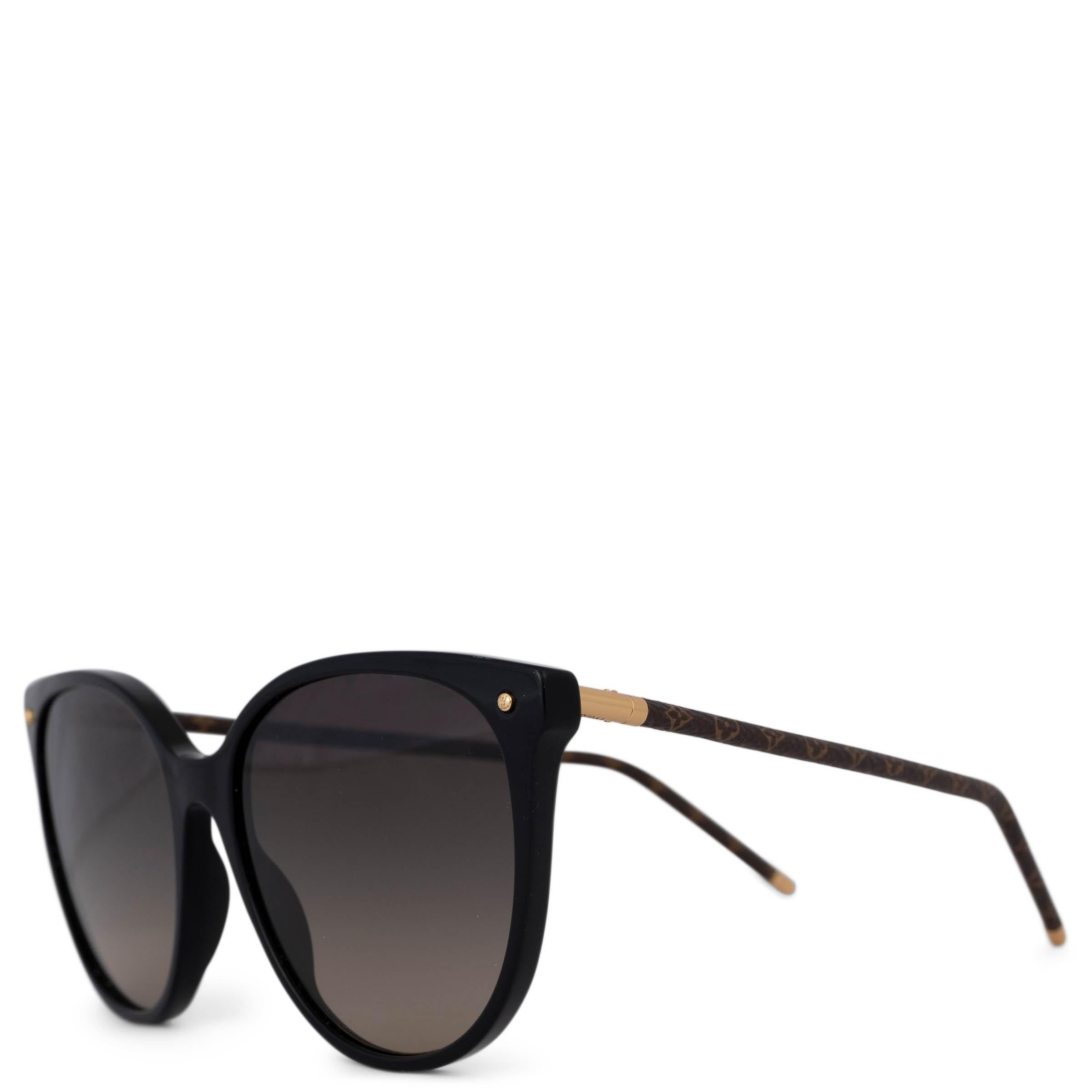 These 100% authentic Louis Vuitton LV First Round sunglasses are crafted from black acetate and feature sleek black lenses. The design showcases the classic Monogram canvas on the temples, along with delicate gold-tone hinges, tips, and studs on the