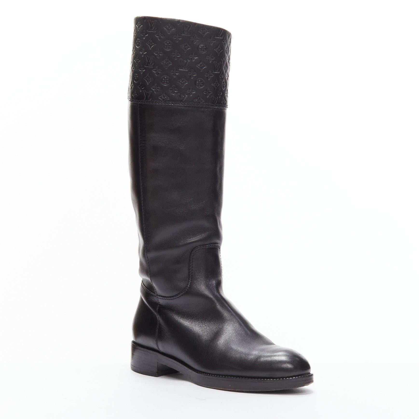 LOUIS VUITTON black LV monogram embossed leather pull on riding boots EU37.5
Reference: TGAS/D00671
Brand: Louis Vuitton
Material: Leather
Color: Black
Pattern: Monogram
Closure: Slip On
Lining: Black Leather
Extra Details: LV logo monogram embossed