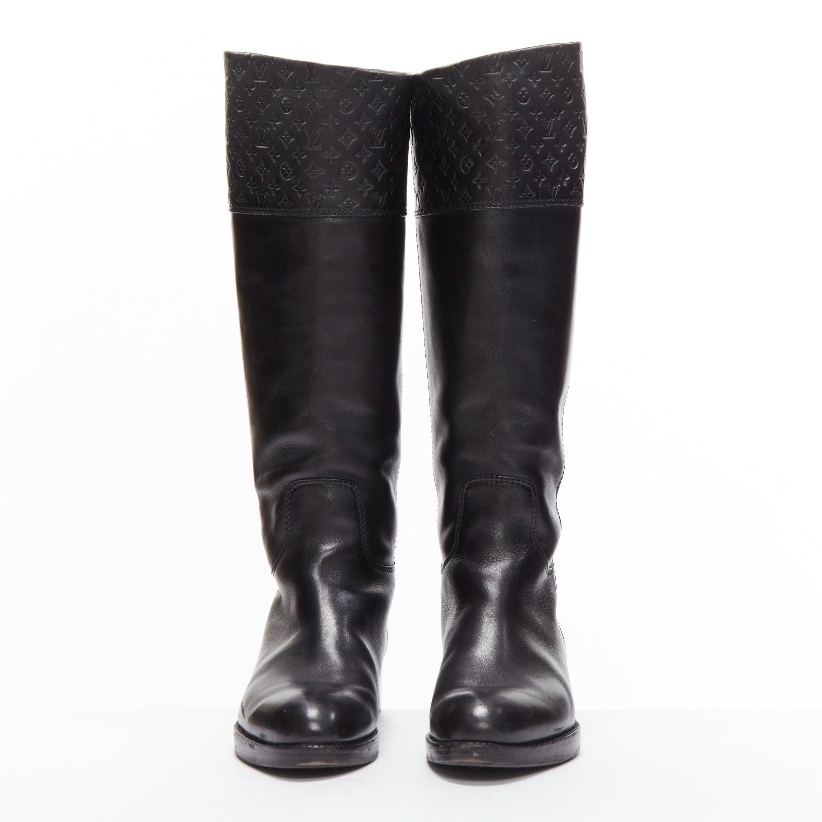 Black LOUIS VUITTON black LV monogram embossed leather pull on riding boots EU37.5