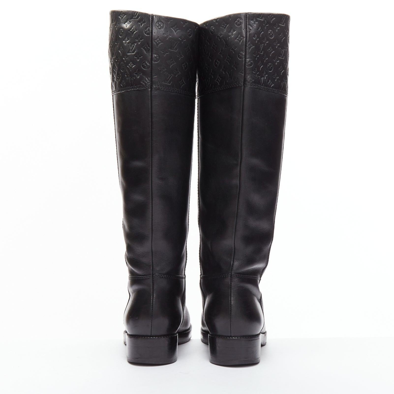 Women's LOUIS VUITTON black LV monogram embossed leather pull on riding boots EU37.5