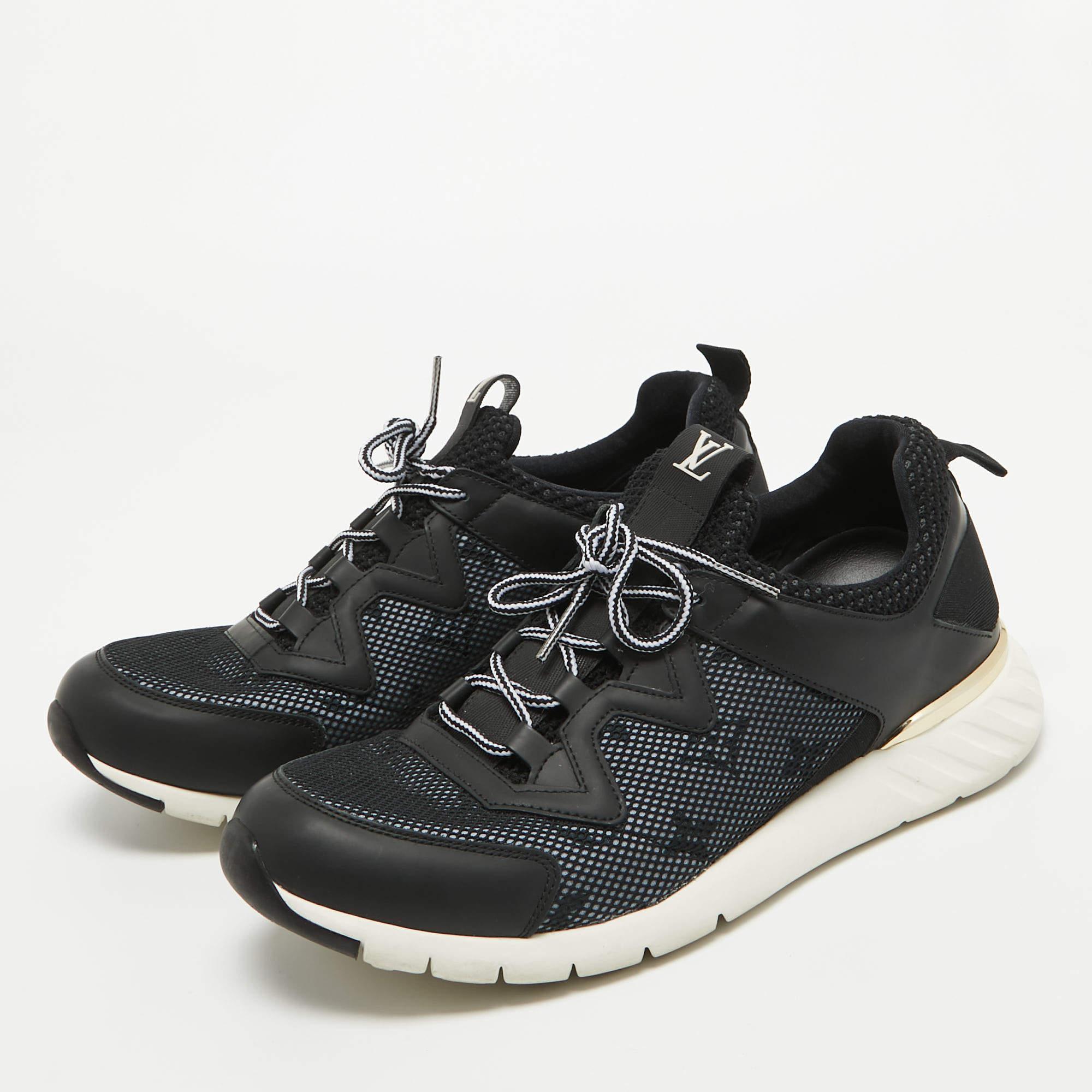 Coming in a classic silhouette these Louis Vuitton black sneakers are a seamless combination of luxury comfort and style. These sneakers are designed with signature details and comfortable insoles.