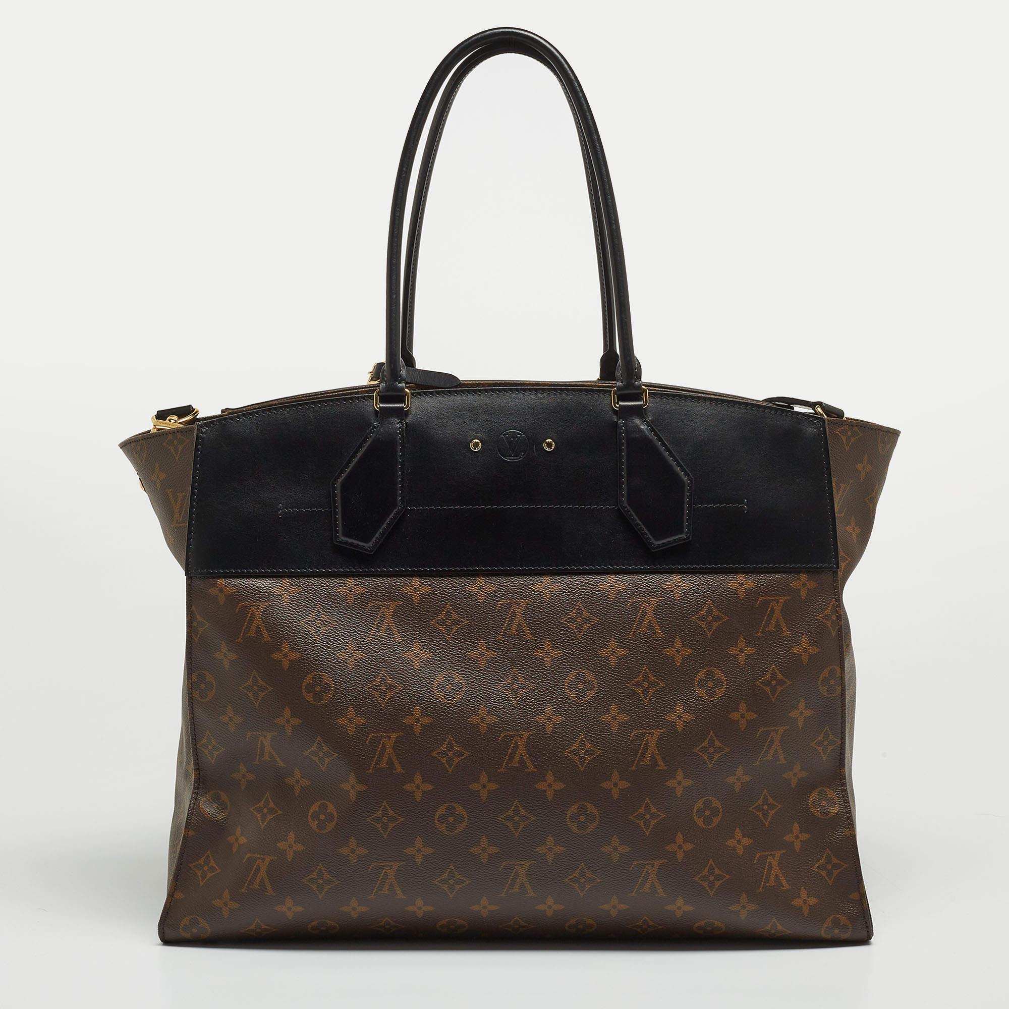 The Louis Vuitton City Steamer bag is an elegant and iconic accessory. It features a black canvas adorned with the signature LV monogram in canvas & leather, exuding timeless luxury. With its structured silhouette, gold-tone hardware, and